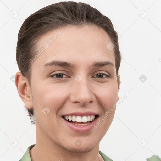 Joyful white young-adult female with short  brown hair and grey eyes