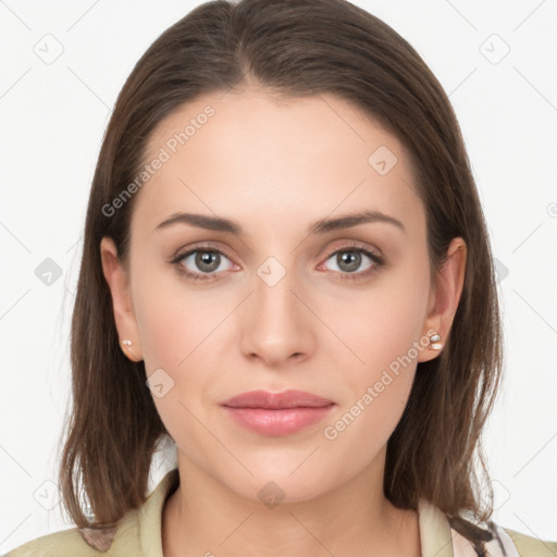 Neutral white young-adult female with long  brown hair and brown eyes