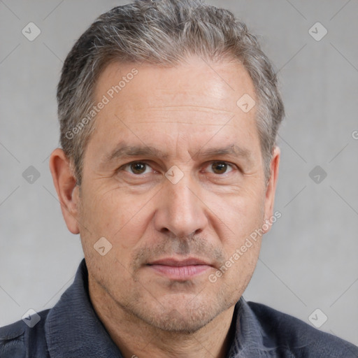 Neutral white middle-aged male with short  brown hair and brown eyes