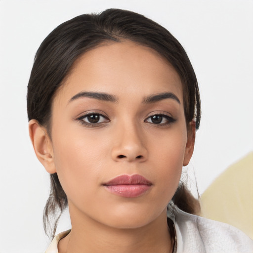 Neutral latino young-adult female with medium  brown hair and brown eyes