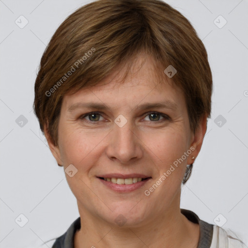 Joyful white adult female with short  brown hair and grey eyes