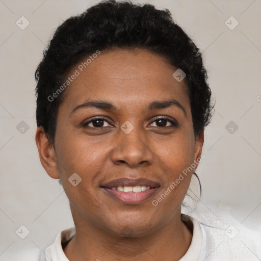 Joyful black adult female with short  brown hair and brown eyes