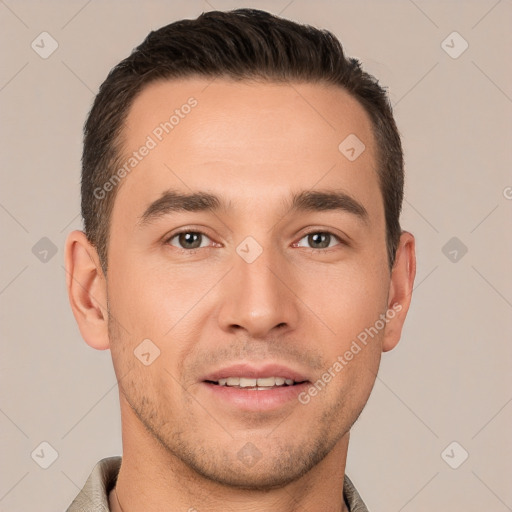 Joyful white young-adult male with short  brown hair and brown eyes