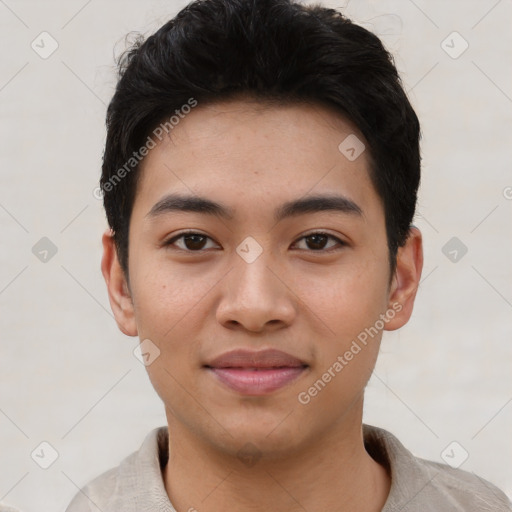 Joyful asian young-adult male with short  black hair and brown eyes