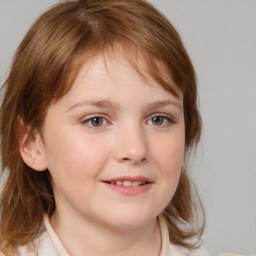 Joyful white child female with medium  brown hair and blue eyes