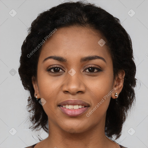 Joyful black young-adult female with medium  black hair and brown eyes