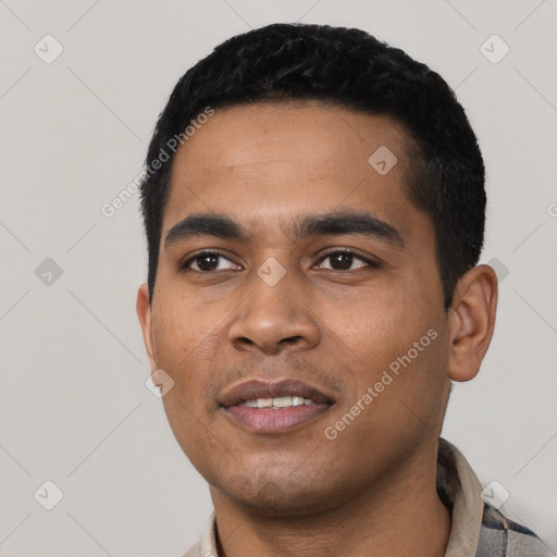 Joyful latino young-adult male with short  black hair and brown eyes