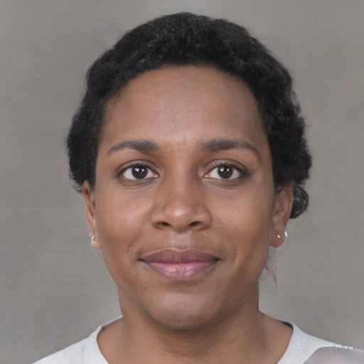 Neutral black adult female with short  black hair and brown eyes