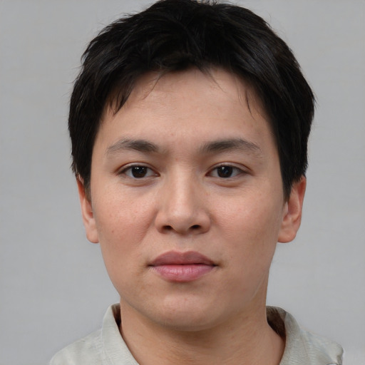 Neutral asian young-adult male with short  brown hair and brown eyes