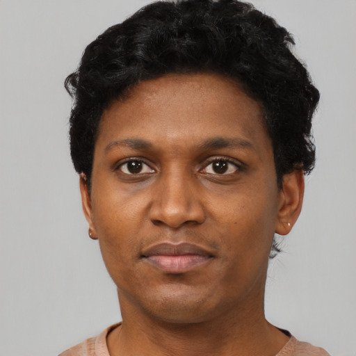 Neutral black young-adult male with short  black hair and brown eyes