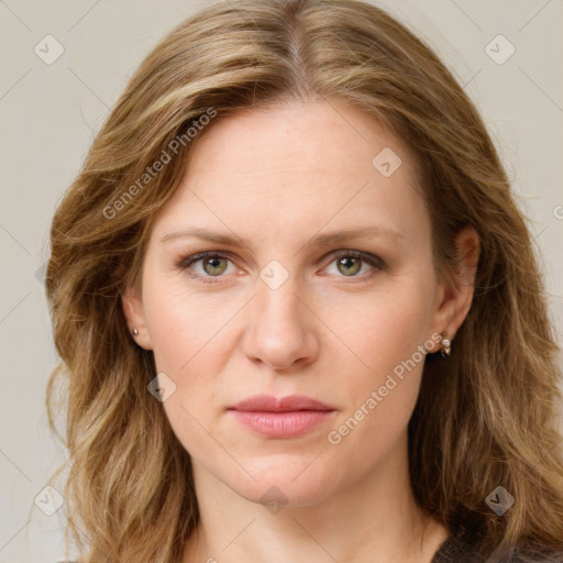 Joyful white young-adult female with long  brown hair and green eyes