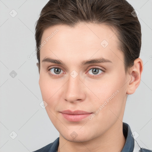 Joyful white young-adult male with medium  brown hair and brown eyes