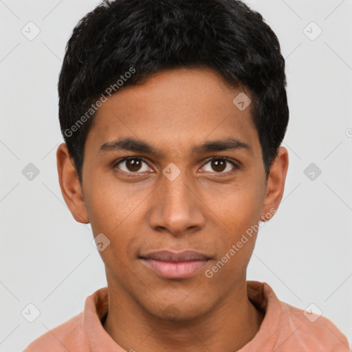 Joyful latino young-adult male with short  brown hair and brown eyes