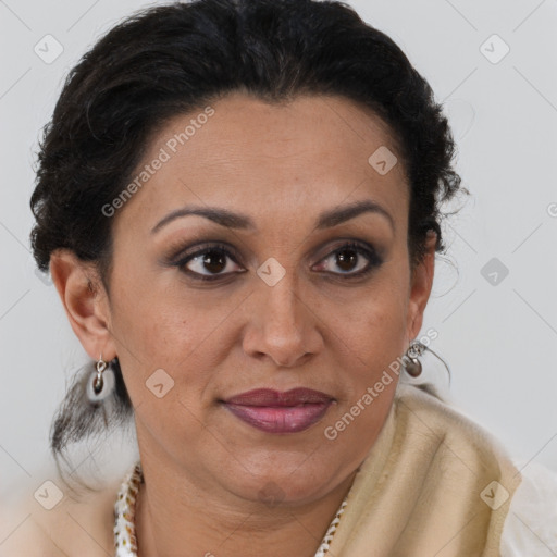 Joyful latino adult female with short  brown hair and brown eyes