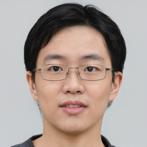 Neutral asian young-adult male with short  brown hair and brown eyes