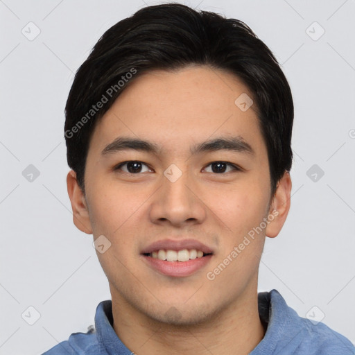 Joyful asian young-adult male with short  black hair and brown eyes