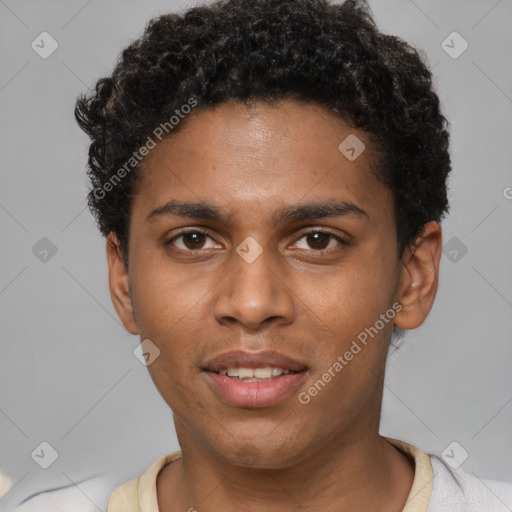 Joyful black young-adult male with short  brown hair and brown eyes