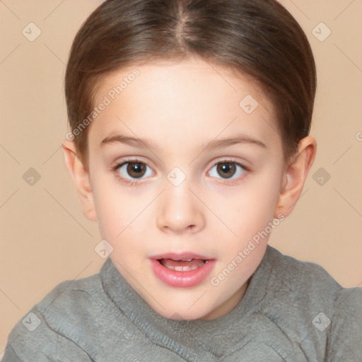 Joyful white child female with short  brown hair and brown eyes