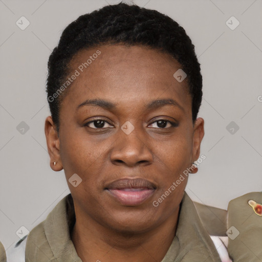 Joyful black young-adult female with short  black hair and brown eyes