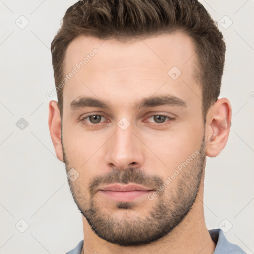 Neutral white young-adult male with short  brown hair and brown eyes