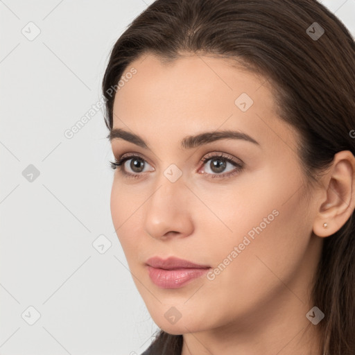 Neutral white young-adult female with long  brown hair and brown eyes