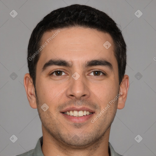 Joyful white young-adult male with short  brown hair and brown eyes