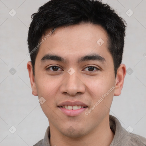 Joyful latino young-adult male with short  black hair and brown eyes