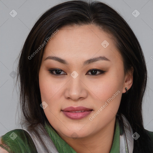 Joyful asian young-adult female with long  brown hair and brown eyes