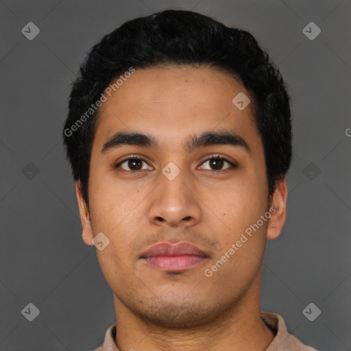 Neutral latino young-adult male with short  black hair and brown eyes