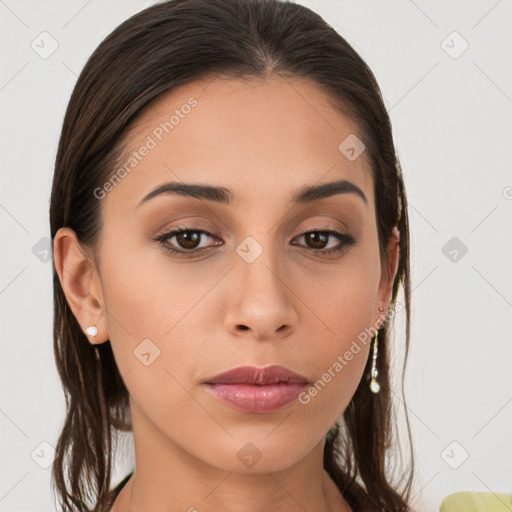 Neutral white young-adult female with long  brown hair and brown eyes