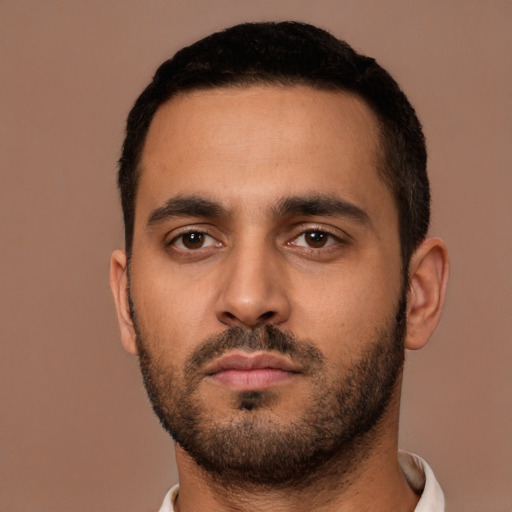 Neutral latino young-adult male with short  black hair and brown eyes