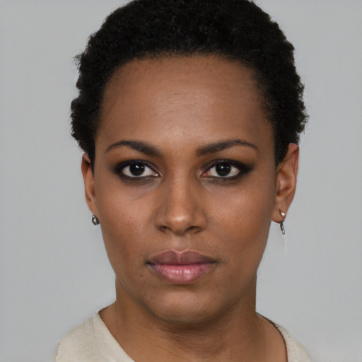 Neutral black young-adult female with short  black hair and brown eyes