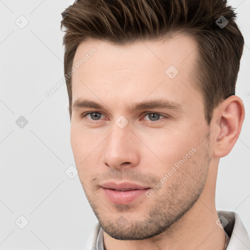 Neutral white young-adult male with short  brown hair and brown eyes