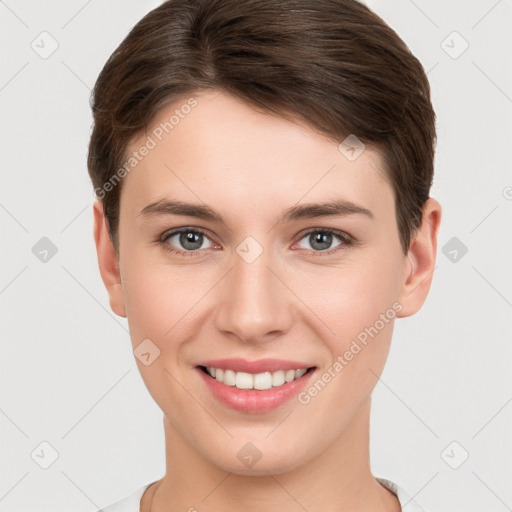 Joyful white young-adult female with short  brown hair and brown eyes