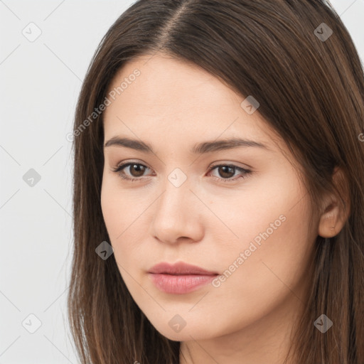 Neutral white young-adult female with long  brown hair and brown eyes