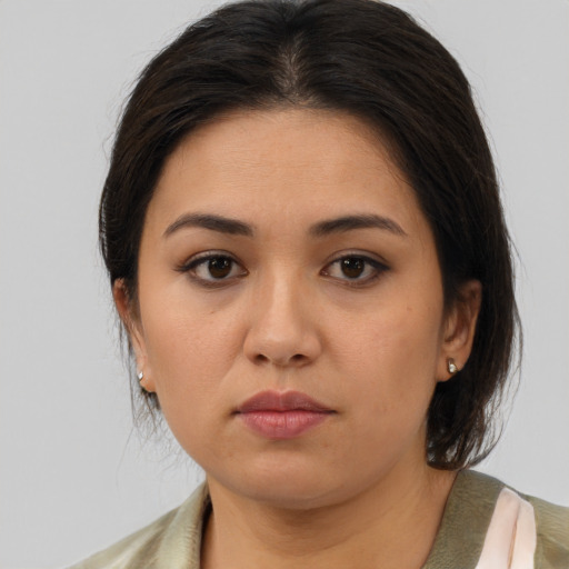 Neutral asian young-adult female with medium  brown hair and brown eyes