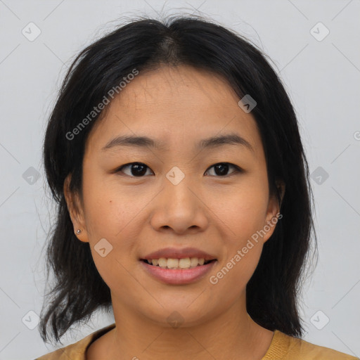 Joyful asian young-adult female with medium  brown hair and brown eyes