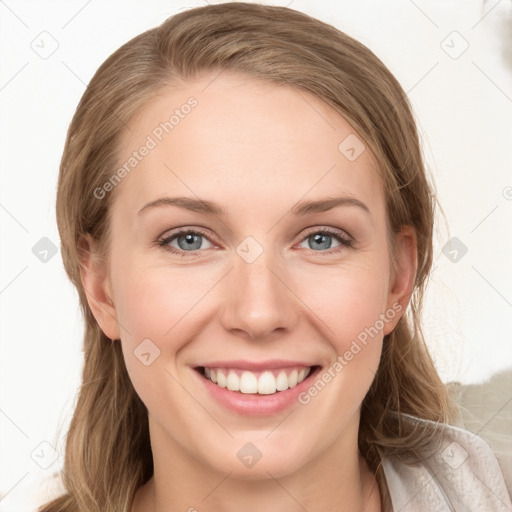 Joyful white young-adult female with long  brown hair and blue eyes