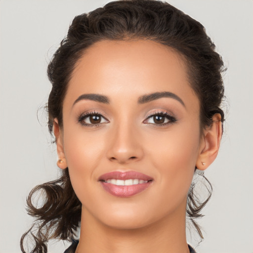 Joyful white young-adult female with long  brown hair and brown eyes