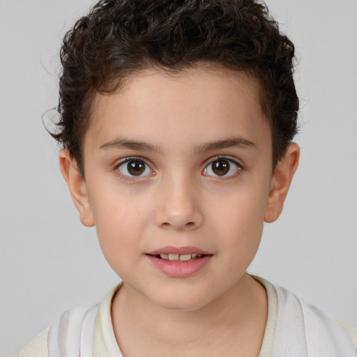 Joyful white child female with short  brown hair and brown eyes