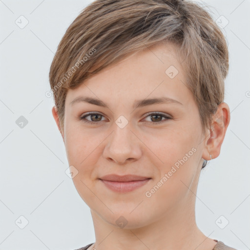 Joyful white young-adult female with short  brown hair and grey eyes