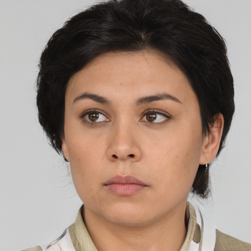 Neutral asian young-adult female with medium  brown hair and brown eyes