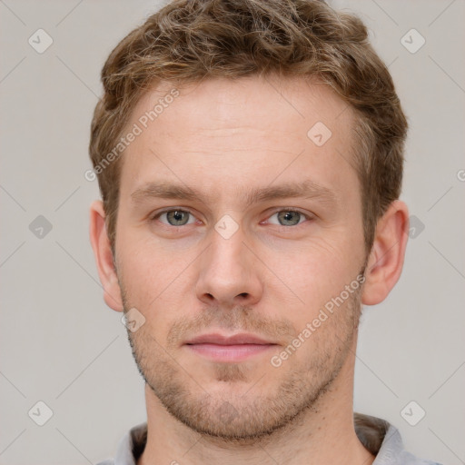 Neutral white young-adult male with short  brown hair and grey eyes