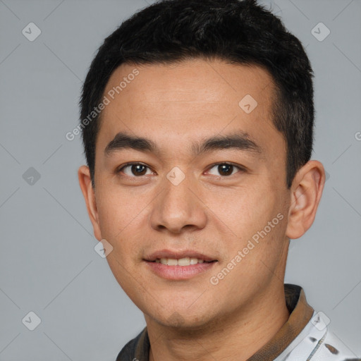 Joyful white young-adult male with short  black hair and brown eyes