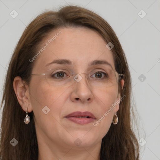 Joyful white adult female with long  brown hair and grey eyes