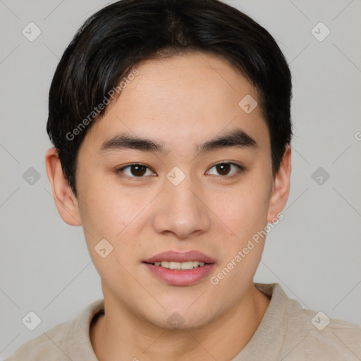 Joyful asian young-adult male with short  brown hair and brown eyes