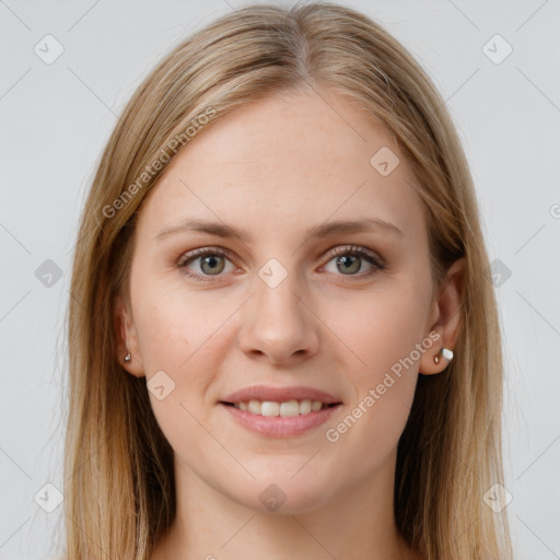 Joyful white young-adult female with long  brown hair and grey eyes