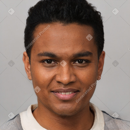 Joyful black young-adult male with short  black hair and brown eyes