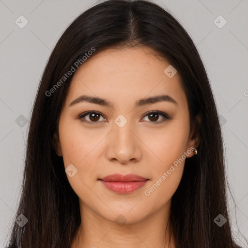 Joyful latino young-adult female with long  brown hair and brown eyes