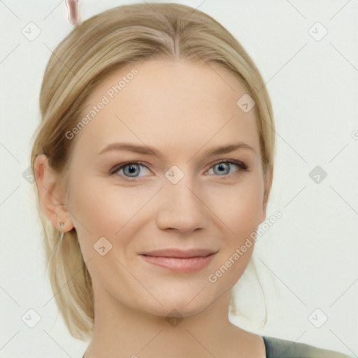 Joyful white young-adult female with medium  brown hair and blue eyes